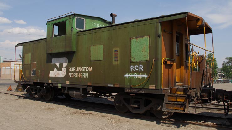 Luxury Caboose “J.J.” in the scrapyard at Great Falls, Montana